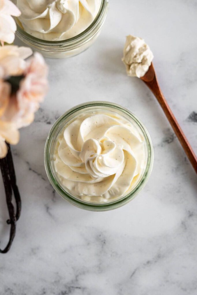 Jar of homemade-style beef tallow face moisturizer used for skin barrier hydration and nourishment.