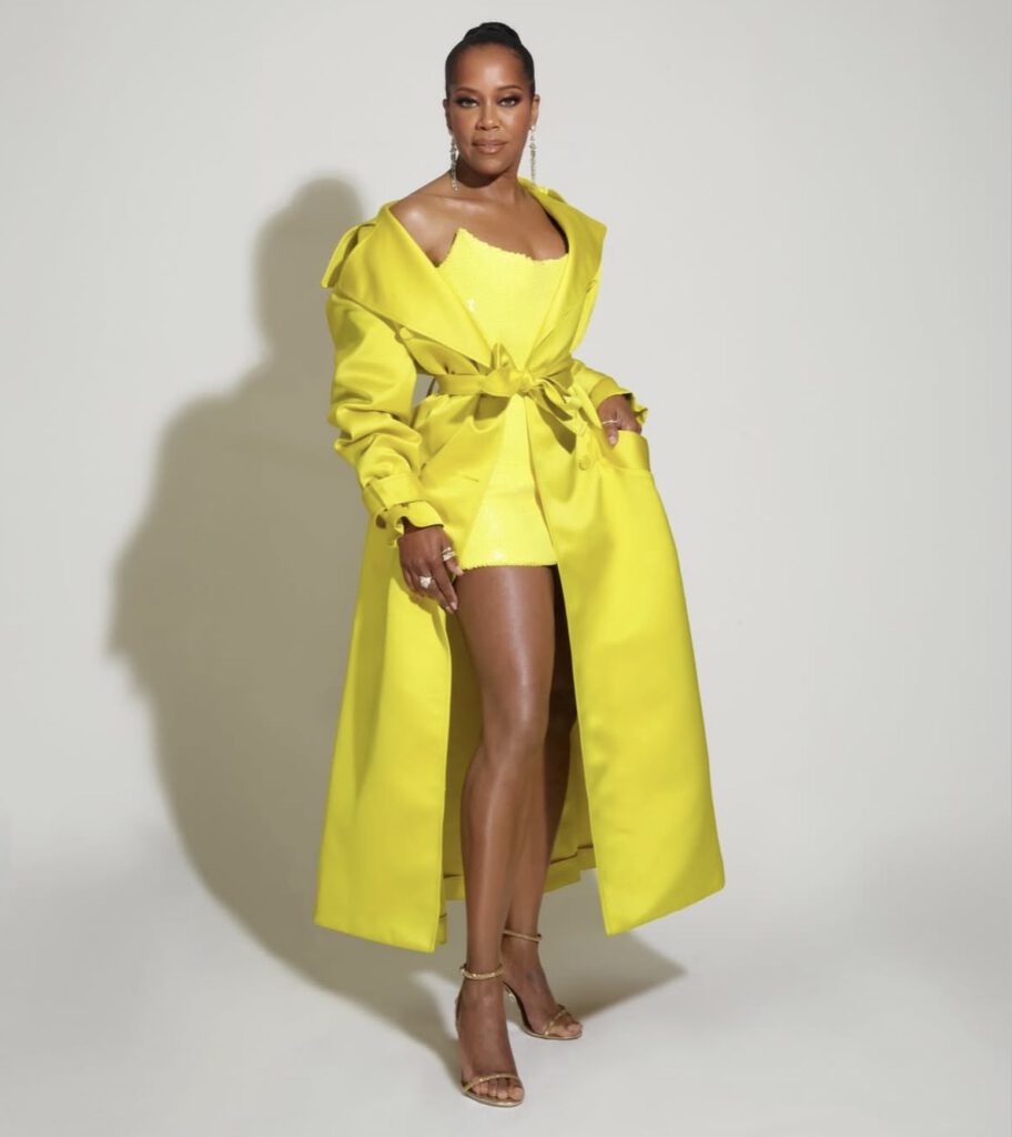 Regina King was wearing a bright yellow Sergio Hudson mini dress with a matching trench coat at the 2026 Vanity Fair Oscars after-party outfits