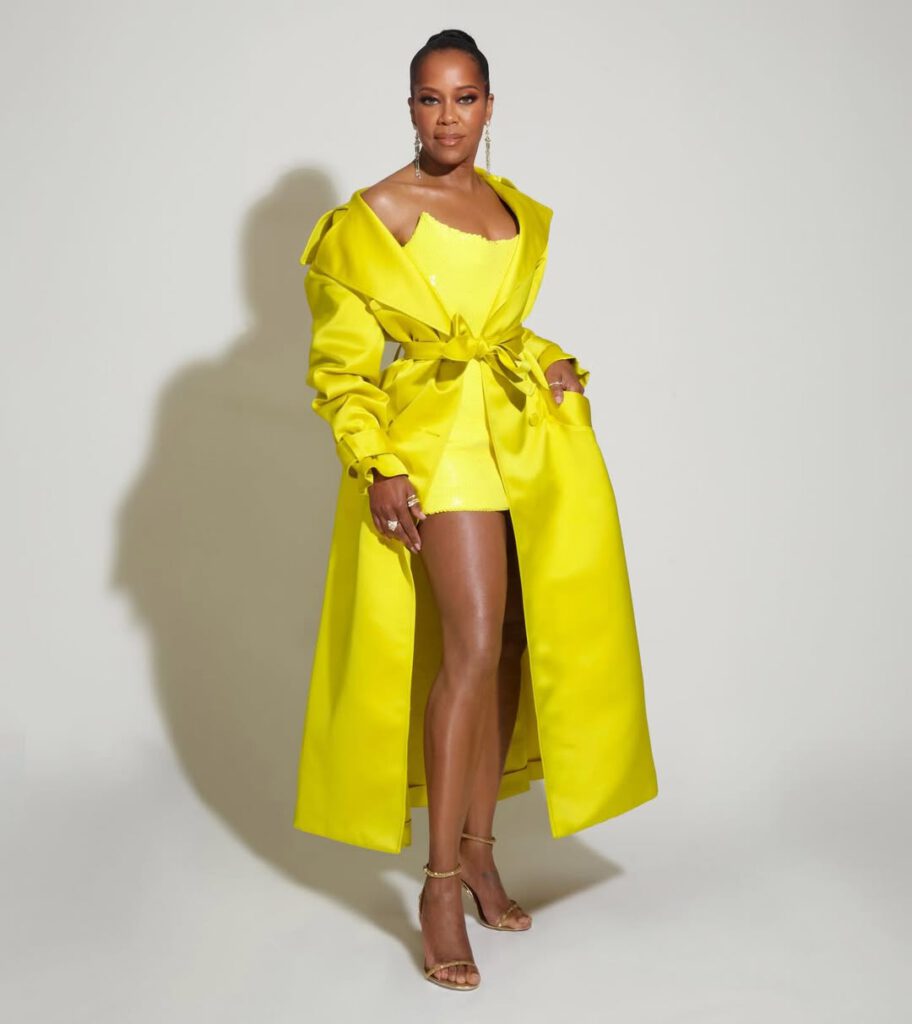 Regina King wearing a custom yellow Sergio Hudson ensemble at the 2026 Vanity Fair Oscars after-party.